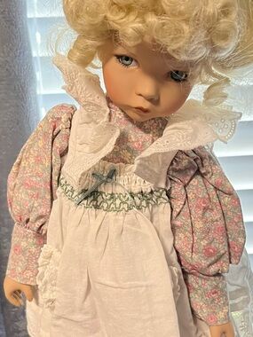 Vintage-Style Porcelain Doll & Includes Stand. Doll in Pink Floral Dress